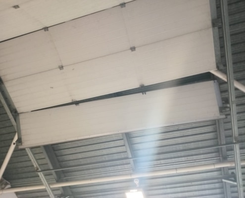 large sectional door repaired in Warrington by UK Doors & Shutters