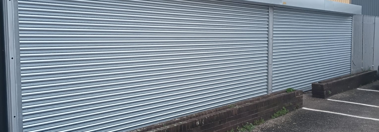 HITAS flood damaged roller shutter repaired by UK Doors & Shutters