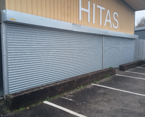 HITAS flood damaged roller shutter repaired by UK Doors & Shutters
