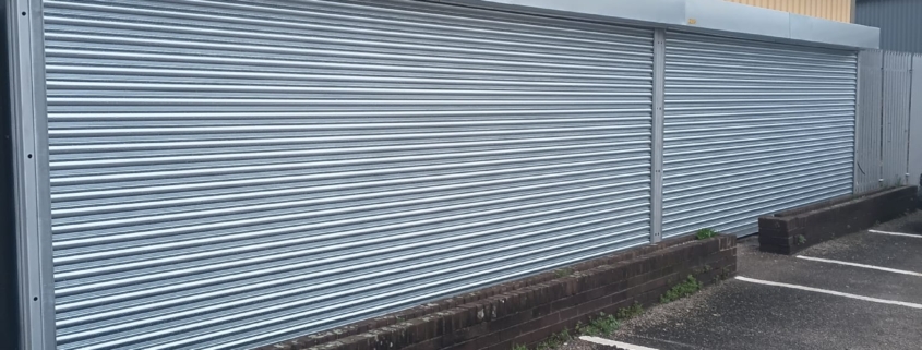 HITAS flood damaged roller shutter repaired by UK Doors & Shutters