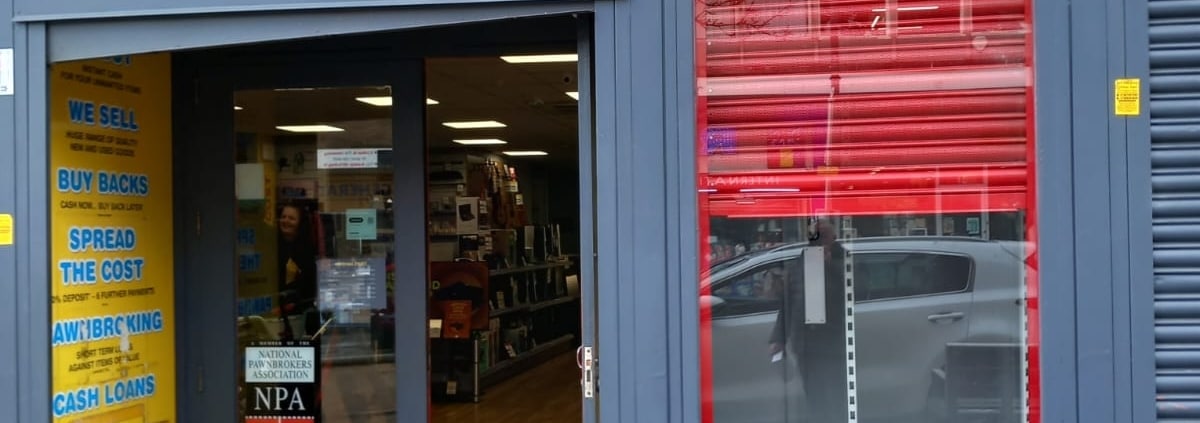 cash converters roller shutter repaired by UK Doors & Shutters