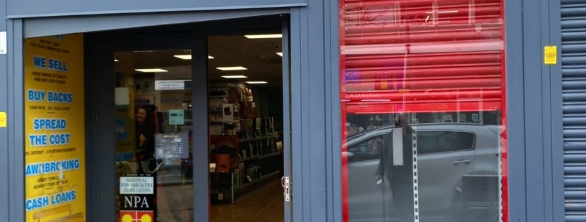 cash converters roller shutter repaired by UK Doors & Shutters